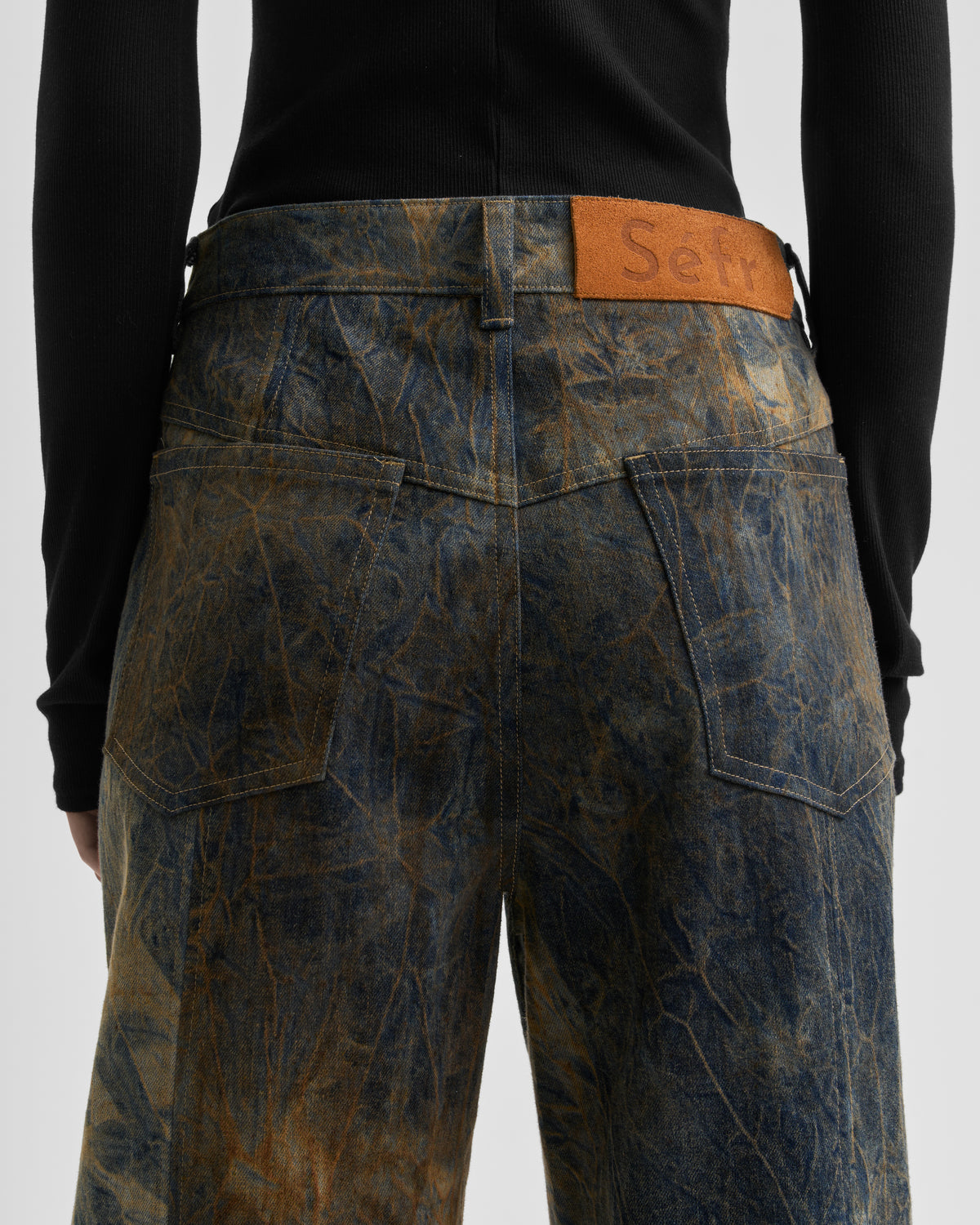 OVER-DYED BACK SLIT JEANS muted neuterals